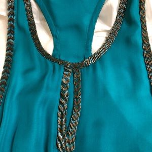 NWT. Stunning Sleeveless silk top with sequins